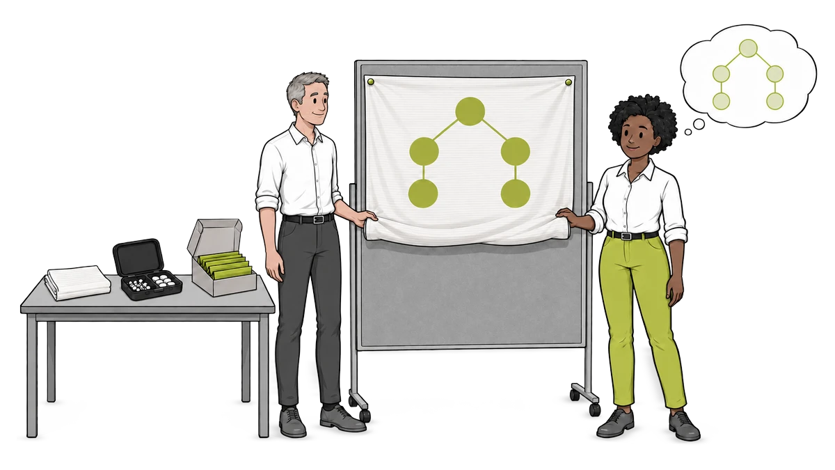 Zwei Figuren stehen an einer Pinnwand mit einem Stoffchart, daneben ein Tisch mit Seminarmaterial